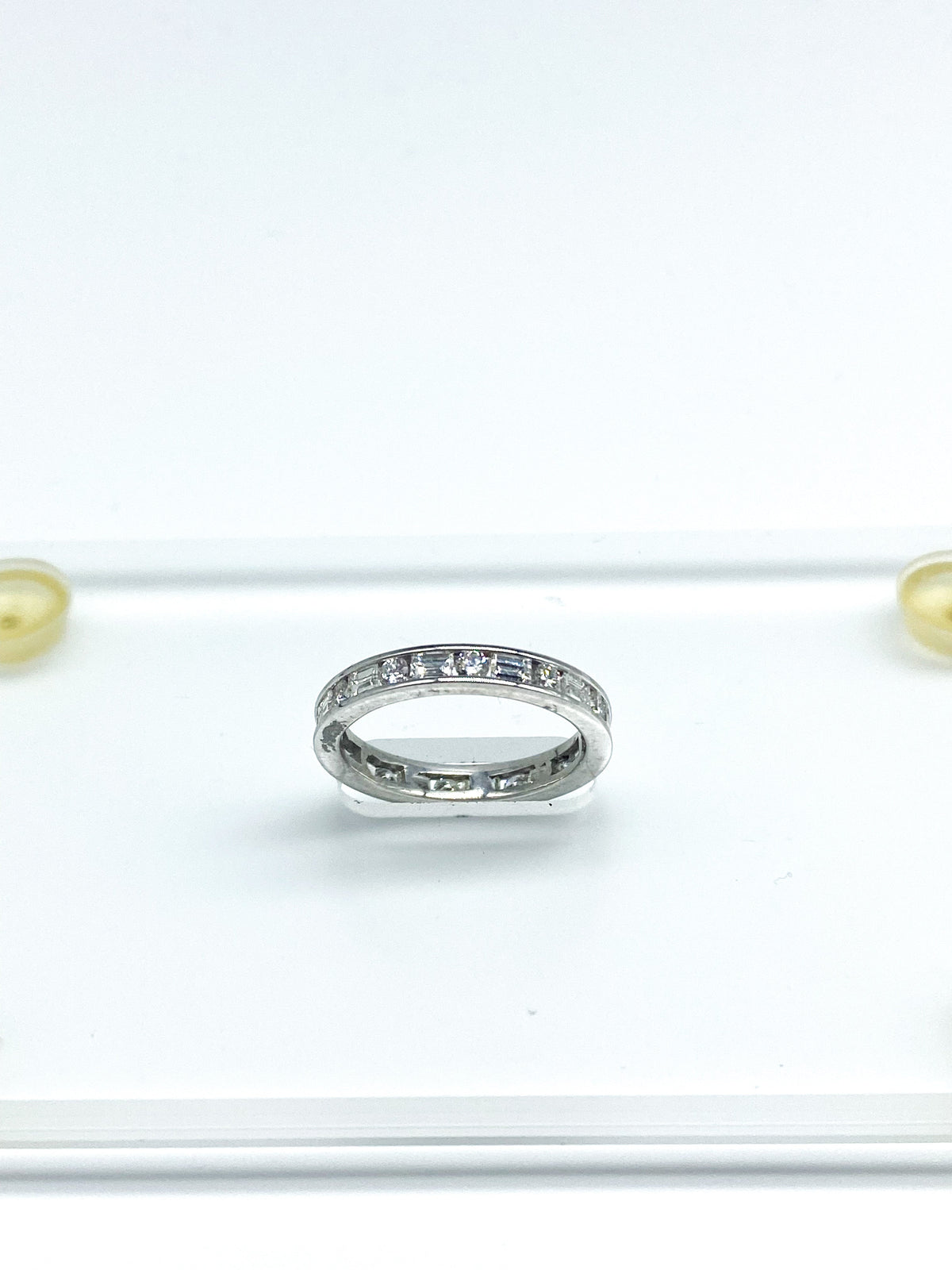 .60 Point Round Brilliant Cut and .60 Point Baguette Diamond Ring