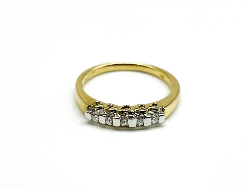 .15 Point Round Brilliant Cut Diamond Ring