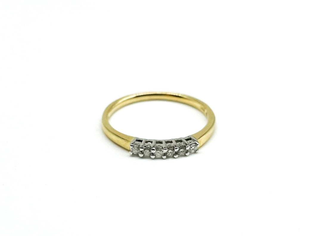.15 Point Round Brilliant Cut Diamond Ring