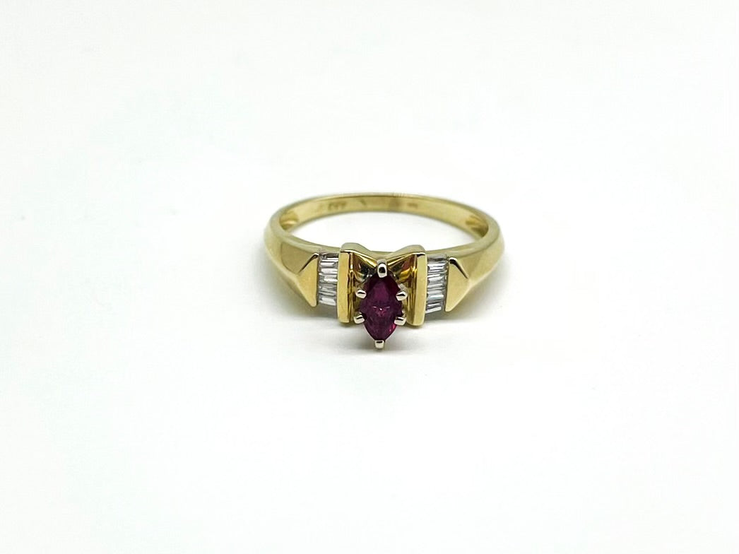 .33 Point Marquise Cut and .18 Point Baguette Cut Diamond Ring