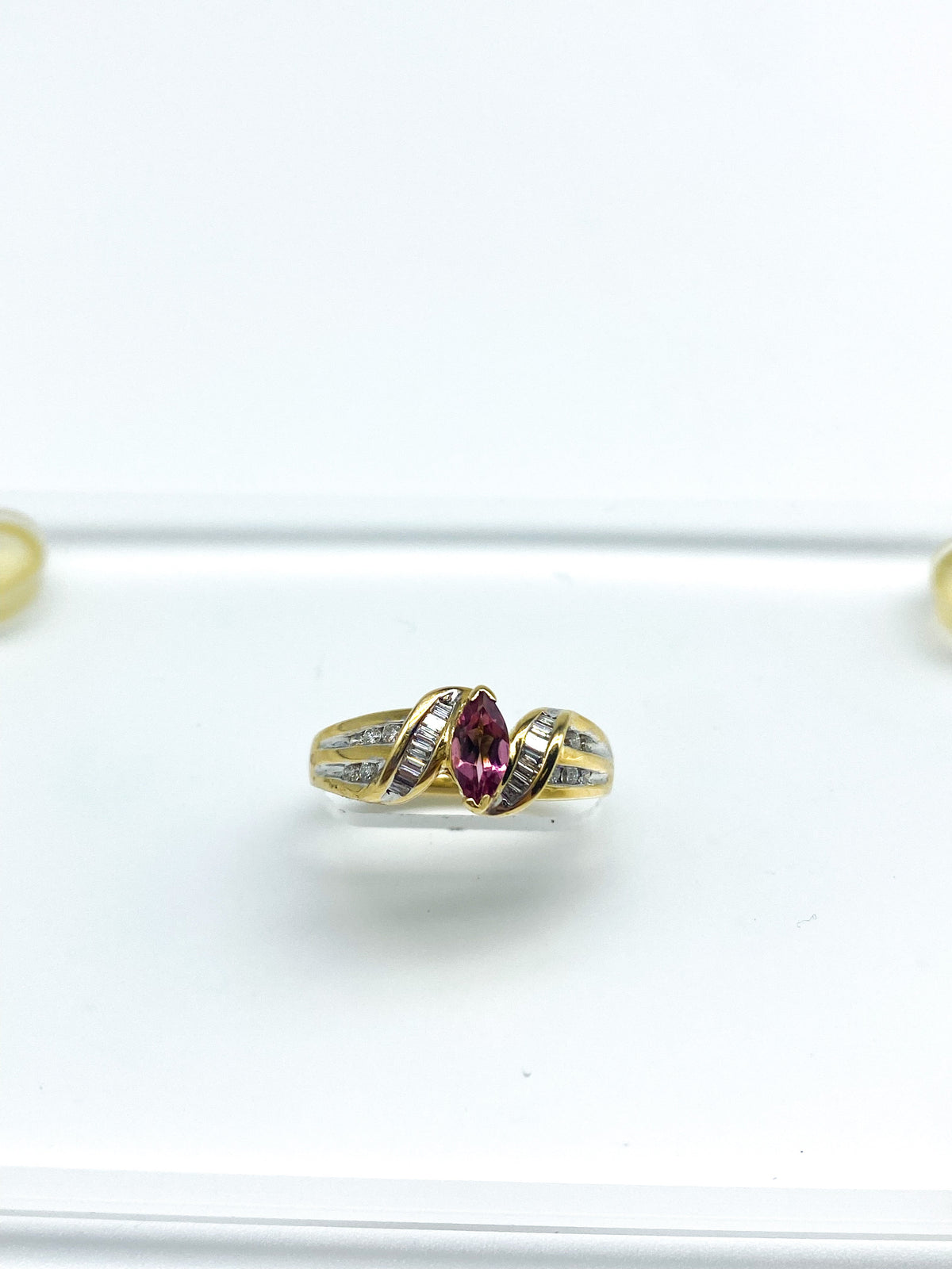 .50 Point Marquise Cut and .50 Point Round Brilliant Baguette Cut Diamond Ring