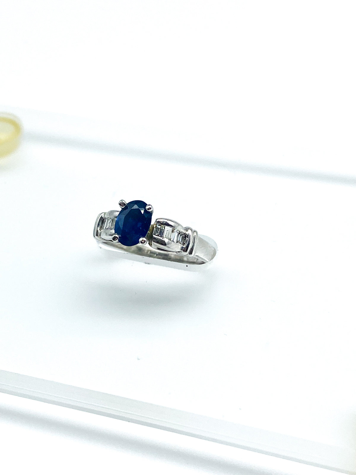 1.00 Point Oval Cut and .32 Point Baguette Cut Diamond Ring