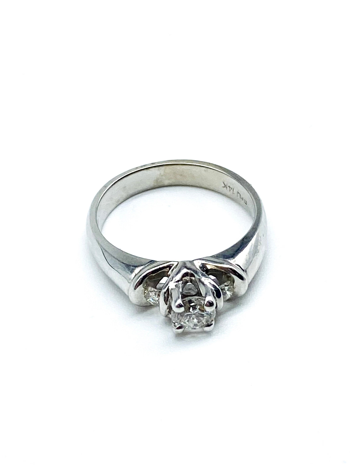 .18 Point Round Brilliant Cut .08 Point Round Brilliant Cut Diamond Ring