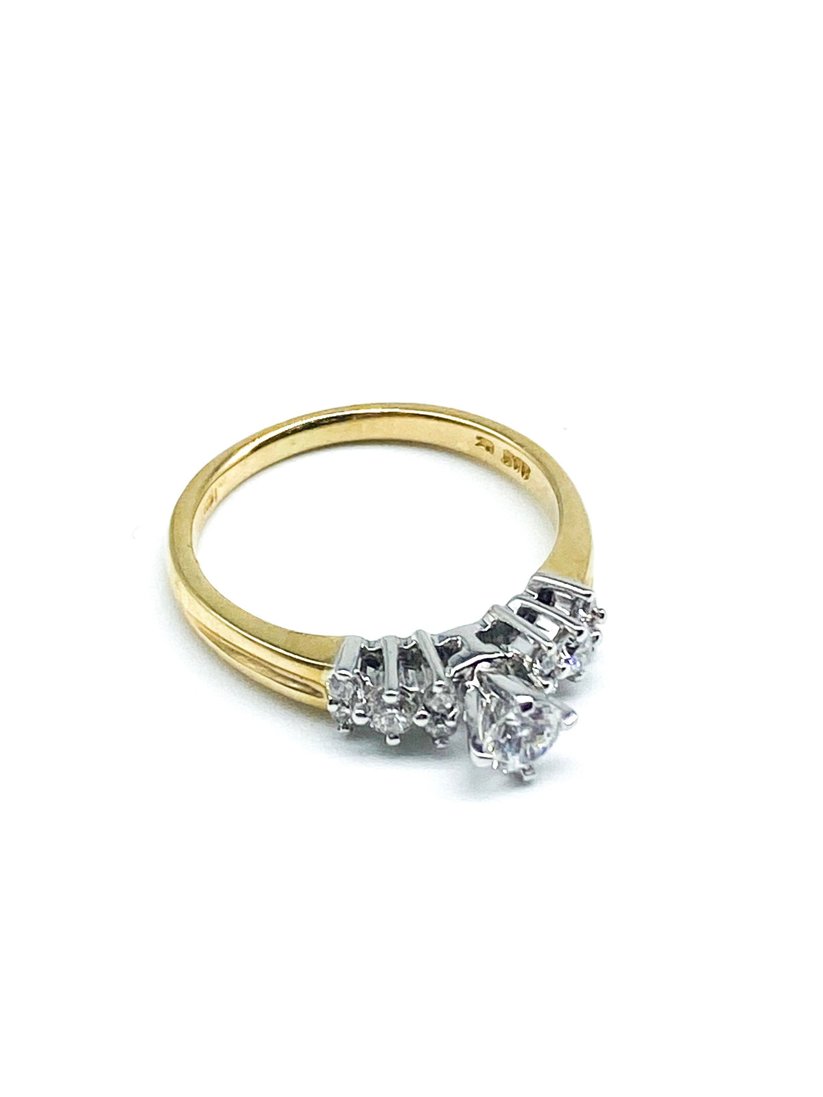 Cubic Zirconia Round Brilliant Cut and .20 Point Round Brilliant Diamond Ring