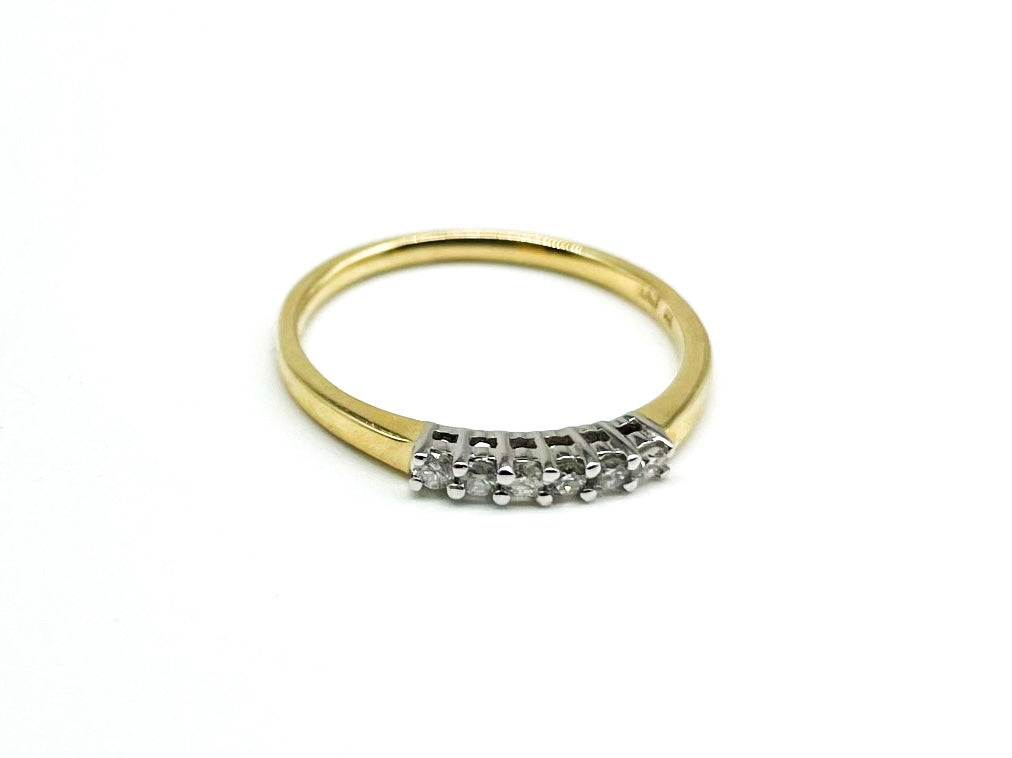 .15 Point Round Brilliant Cut Diamond Ring