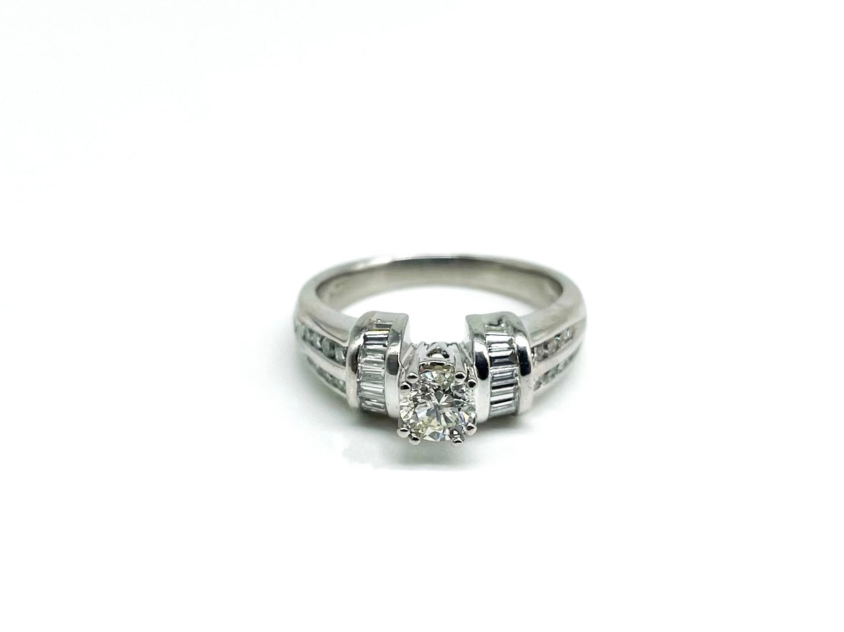 .40 Point Round Brilliant Cut and 1.00 Baguette Round Brilliant Cut Diamond Ring