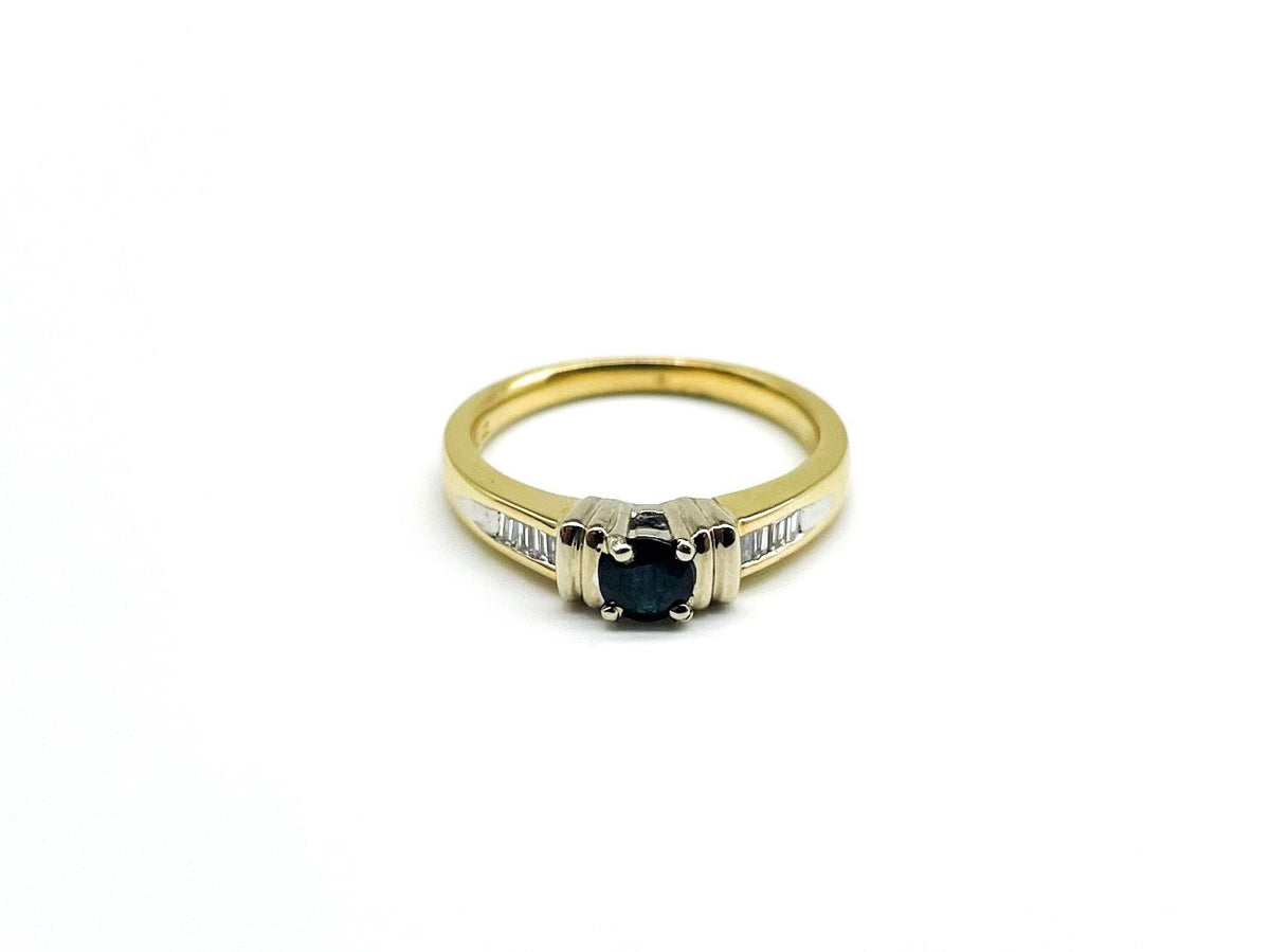 .37 Point Round Brilliant Cut and .35 Point Baguette Cut Diamond Ring