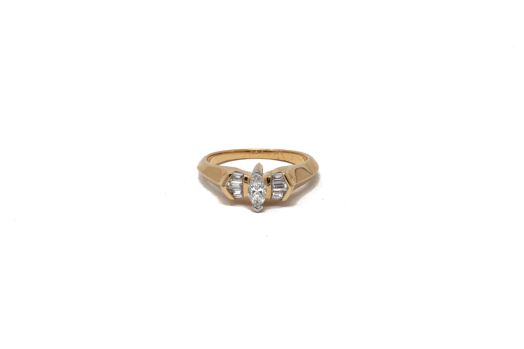 .30 point Marquise Cut and .20 point Tapered Baguettes Cut Diamond Ring
