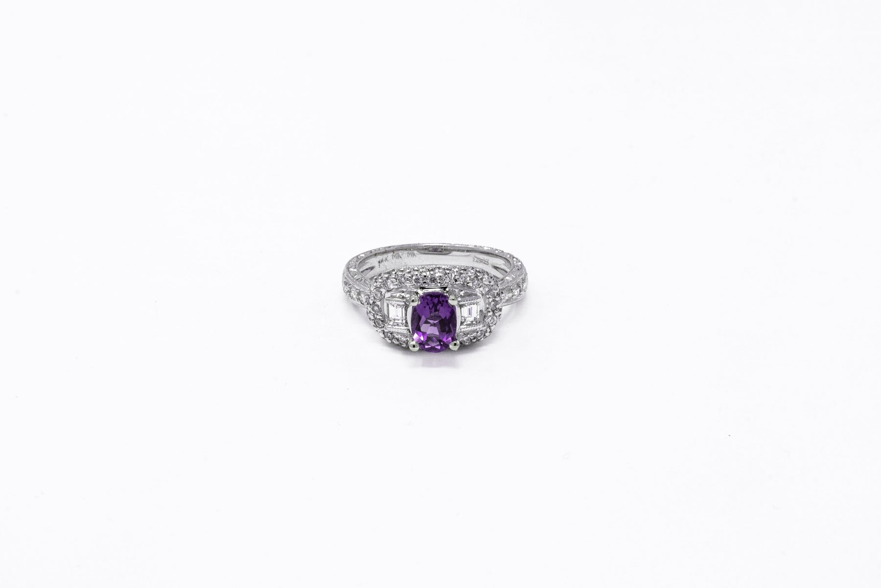 .70 point Oval Cut, .20 point Emerald Cut, and .50 point Round Brilliant Cut Diamond Ring