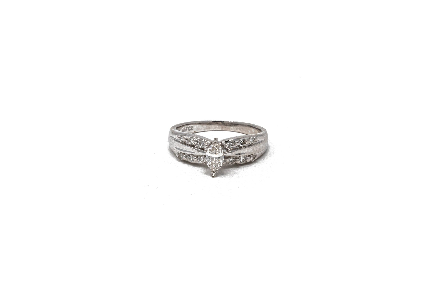 .31 point Marquise Cut and .36 point Round Brilliant Cut Diamond Ring
