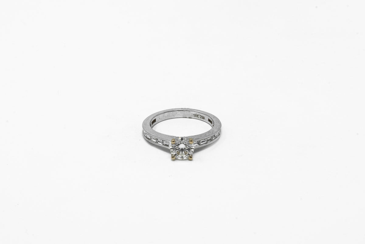 .95 point Round Brilliant Cut and .93 point Baguette and Round Brilliant Cut Diamond Ring