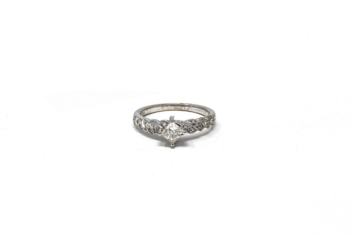 .51 point Princess Cut and .12 point Round Brilliant Cut Diamond Ring