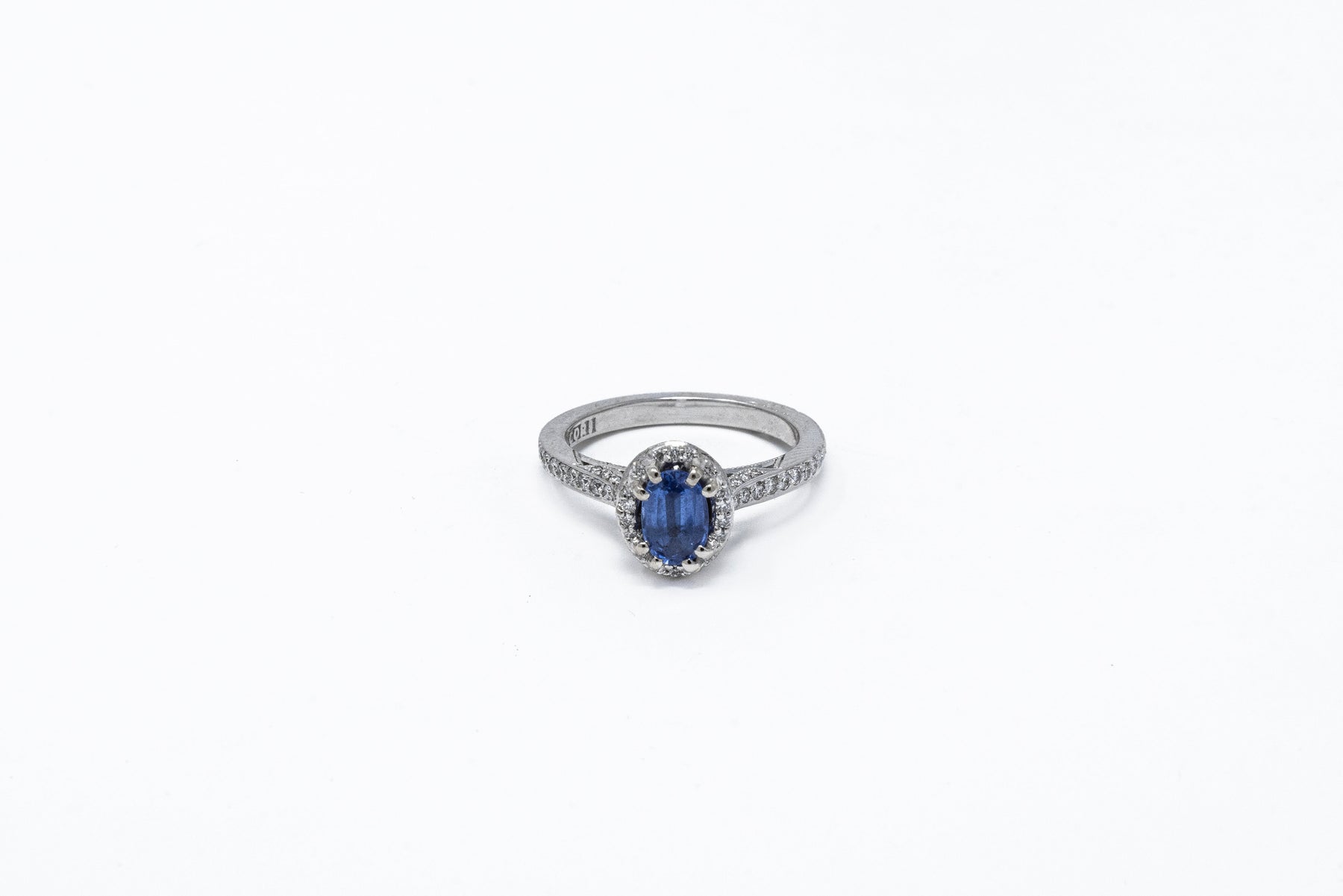 .75 point Oval Cut and .35 point Round Brilliant Cut Diamond Ring