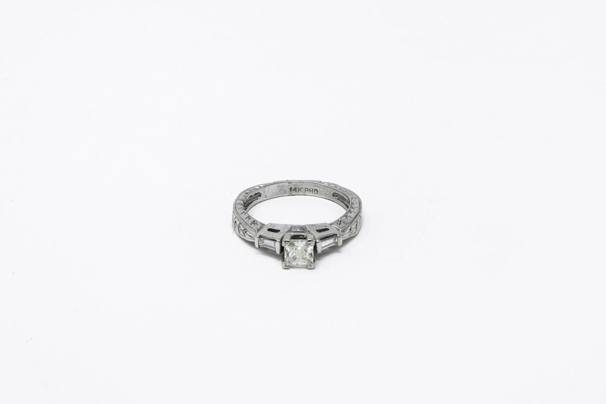 .52 point Princess Cut and .18 point Tapered Baguette Cut Diamond Ring