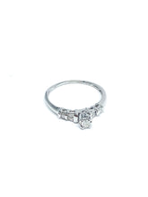 .30 Point Round Brilliant Baguette Cut Diamond Ring