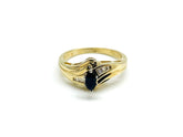 .20 Point Marquise Cut and .15 Point Baguette Cut Diamond Ring