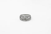 .30 point Round Brilliant Cut and .50 point Straight Baguette Cut Diamond Ring