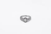 .33 point Marquise Cut and .17 point Round Brilliant Cut Diamond Ring