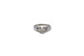 .35 point Pear Cut and .25 Baguette Cut Diamond Ring